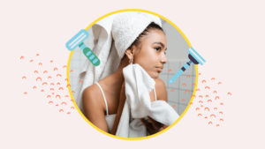 Young woman with a towel on her head drying her face.